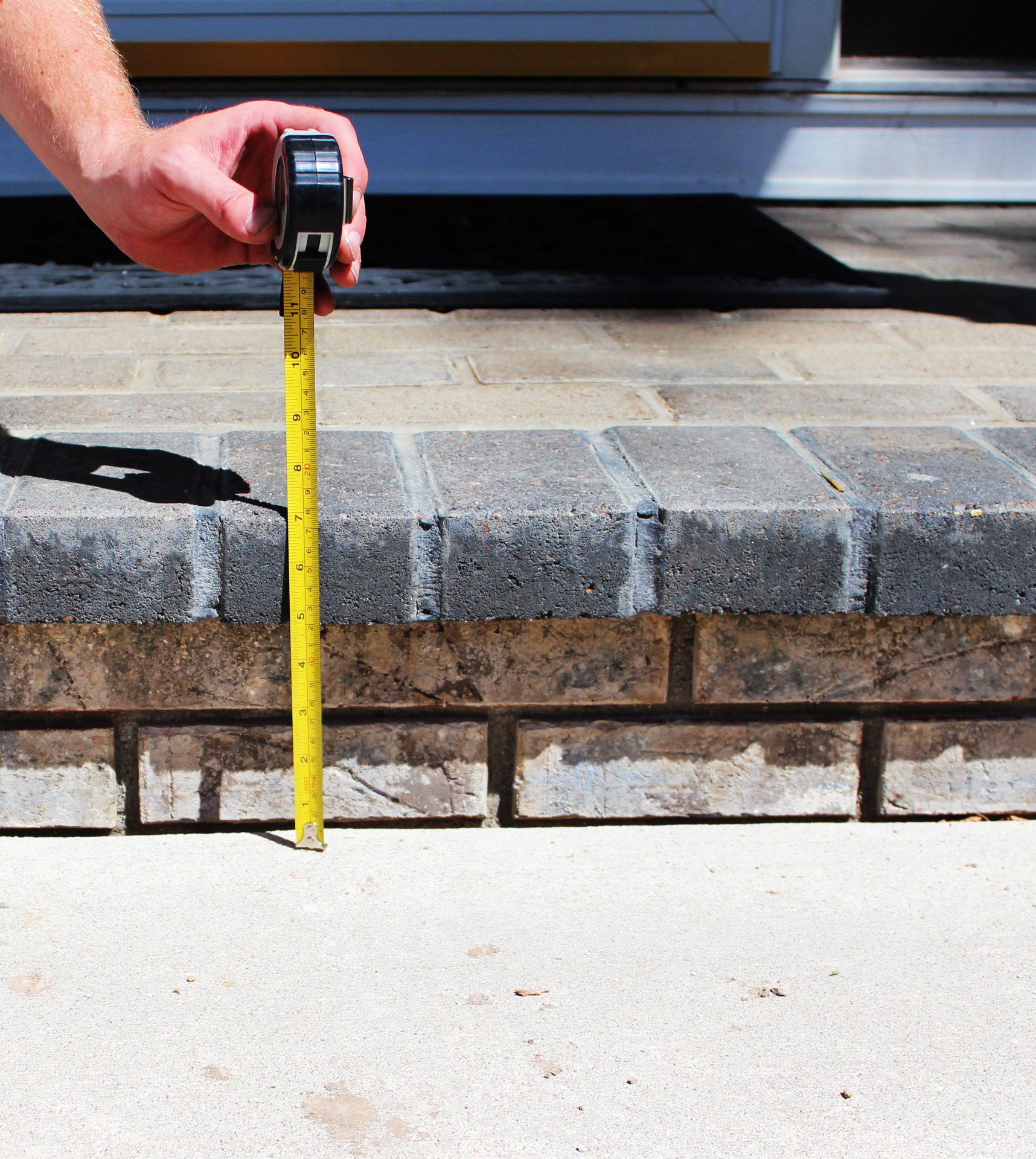Front entry steps raised and level after polyurethane foam lifting
